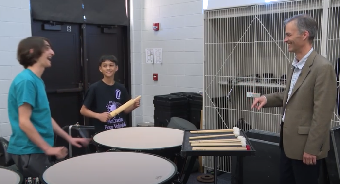 James M Stephenson experimenting with kitchen utensils as percussion with students from the McCracken Middle School Band in Skokie, IL (2016).